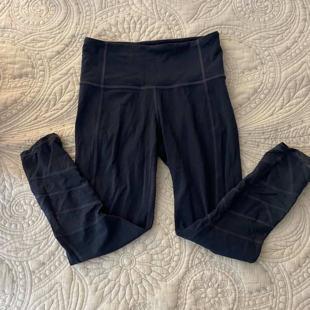 Athleta Dark Stormy Teal Mid-Calf Length Leggings with Zig Zag Patterned Bottom